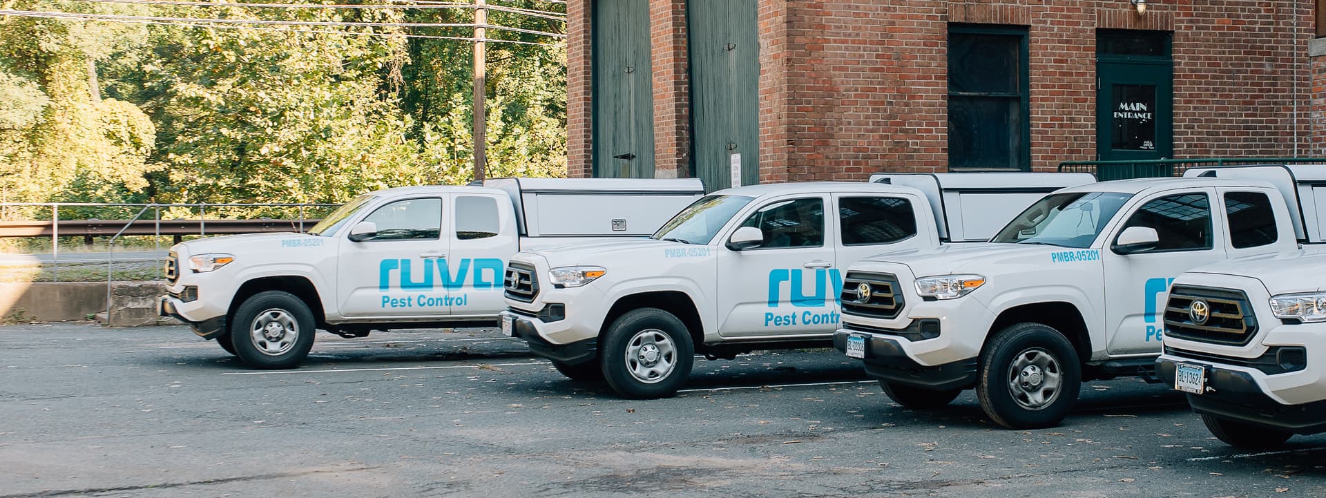 Ruva Pest Control fleet of service trucks